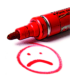 sad face drawn with a red marker